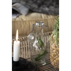 Glasflaske med patentlg til bedelys