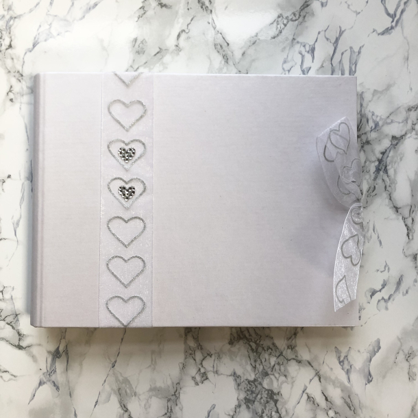 R&ouml;ssler, Gstebog, Hvid med sljfe